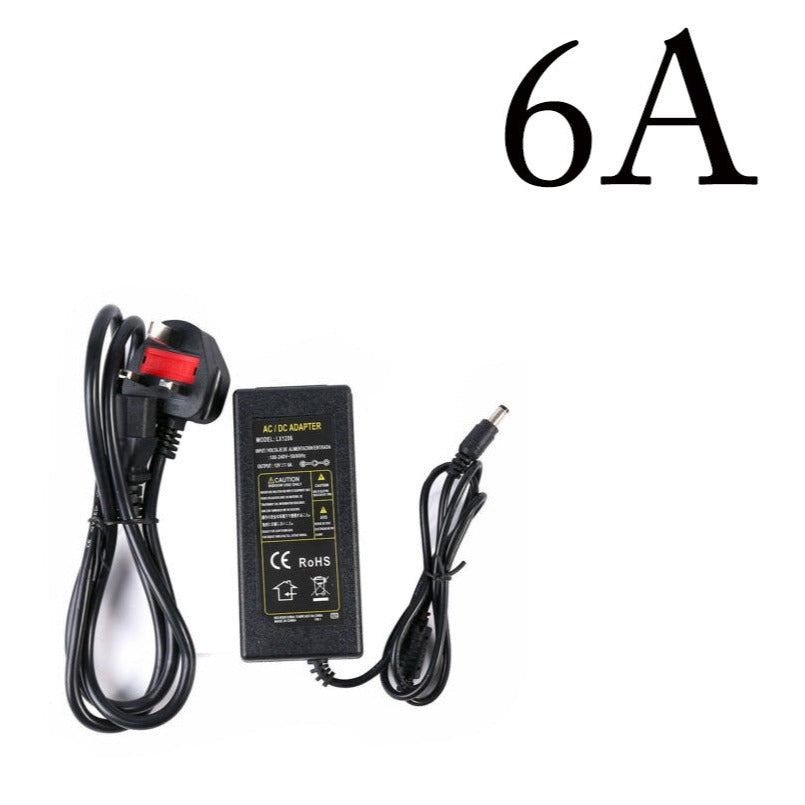 Universal AC to DC 12V UK Plug Power Adapter for LED Lights CCTV
